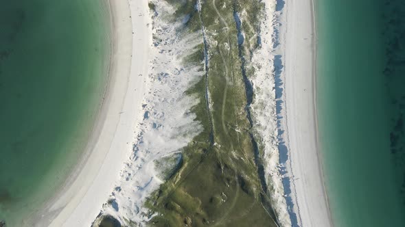 Scenic Aerial View Of Green Coast With White Sand At The Dog's Bay Beach In Roundstone, County Galwa alt