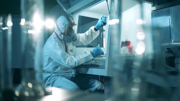 Researcher Is Analyzing Biological Probes in the Laboratory alt