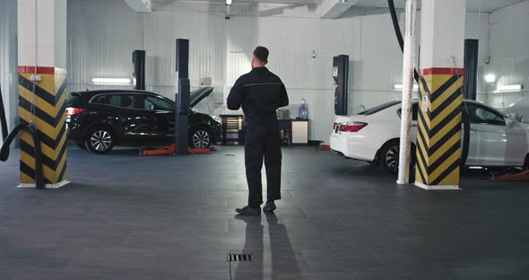 A Good Lo Mechanic All Equipped Dancing in Front alt