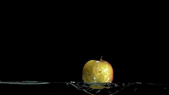 Redgreen Apple is Jumping From the Water in Super Slow Motion alt