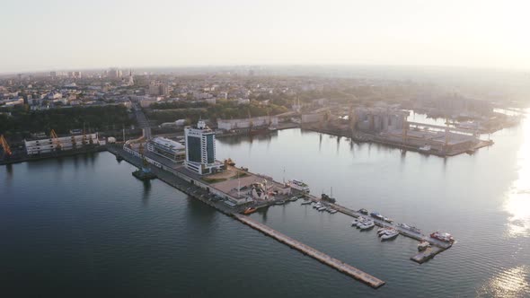 Aerial Panoramic View of Sea Port During Beautiful Sunset alt