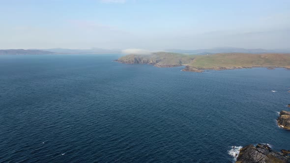 Aerial View of Dunmore Head with Portnoo and Inishkeel Island in County Donegal - Ireland alt