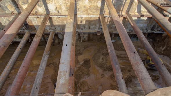 Huge Ditch Pit at the Construction Site of the Underground Metro Station Line Timelapse alt