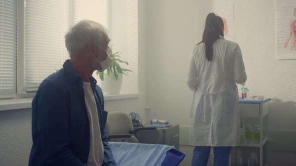 Old Man Waiting Medical Examination in Clinic Close Up alt