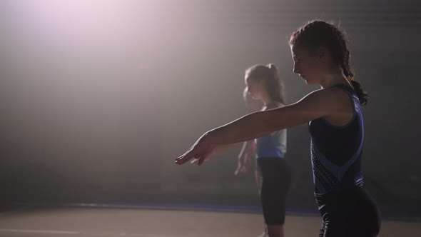 Three Adolescents Girls are Training Floor Exercises Preparing to Competition of Artistic alt