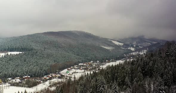 Forest Covered with Snow Aerial View, Aerial View of Village in Mountains alt