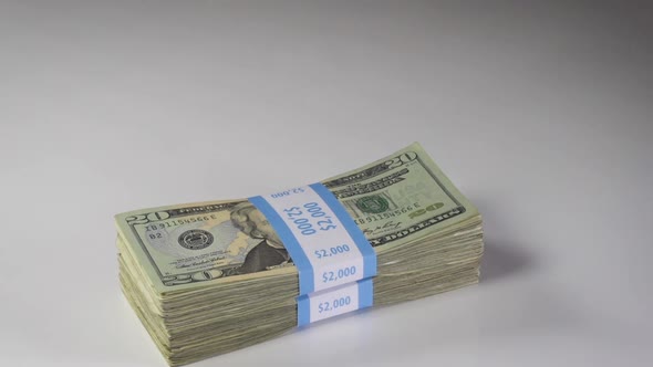 Stacking Money On The Table alt