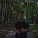 Athletic Young Man Trains for Marathon Run in Park - VideoHive Item for Sale