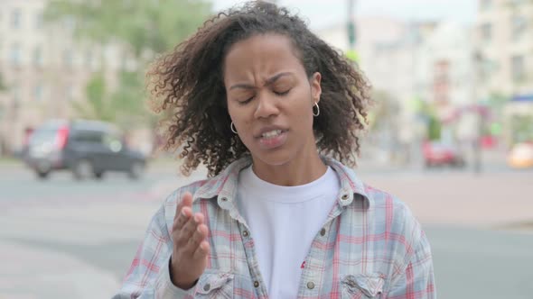 Portrait of Angry African Woman Fighting Outdoor alt