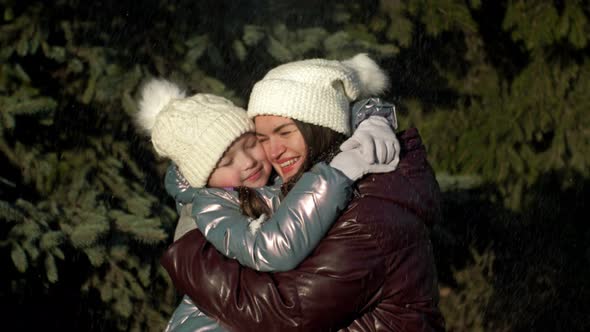Young Woman and a Girl of 78 Years Old Tenderly Hug Each Other