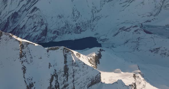 Drone Over Kitzsteinhorn Mountain Peak And Lake alt