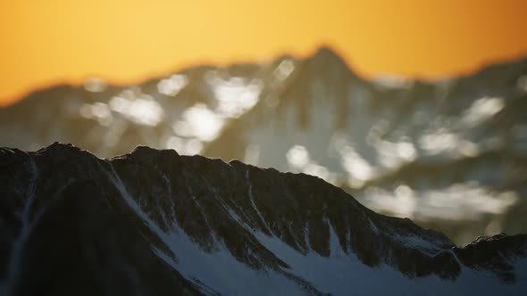 Winter Landscape in Mountains at Sunset alt