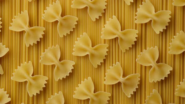 Italian pasta farfalle and spaghetti top view. traditional type of pasta alt