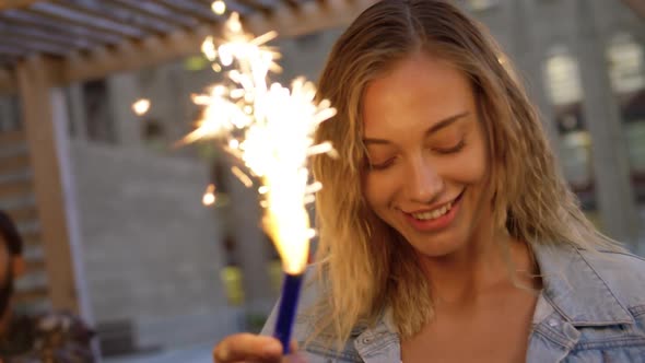 Young woman hanging out on a rooftop alt