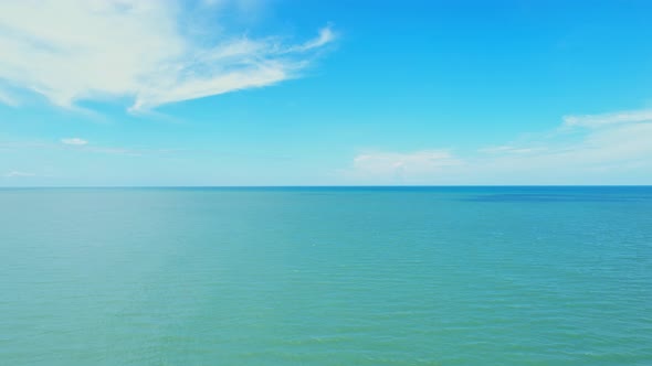 Aerial view over the sea, beautiful turquoise water alt