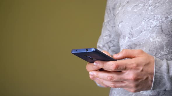 Man Working on Smartphone or Searching Something in Internet