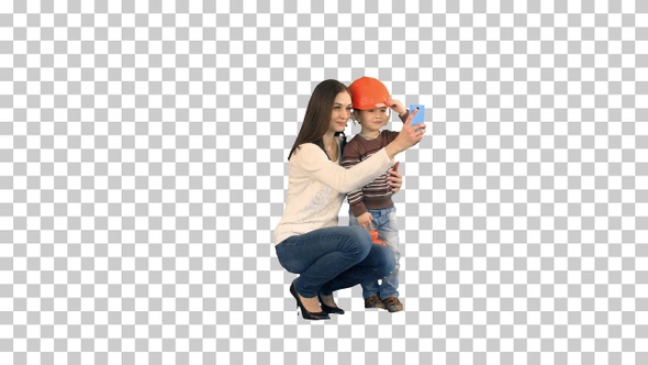 Boy taking a selfie with her mother, Alpha Channel