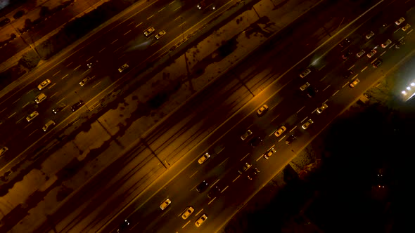 Spectacular highway and convergence of roads at night, transportation and infrastructure development