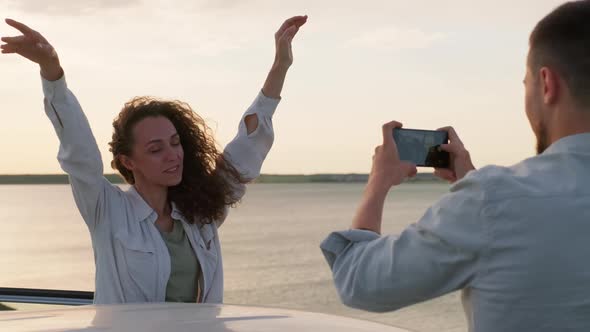 Taking Photos Of Beautiful Woman alt