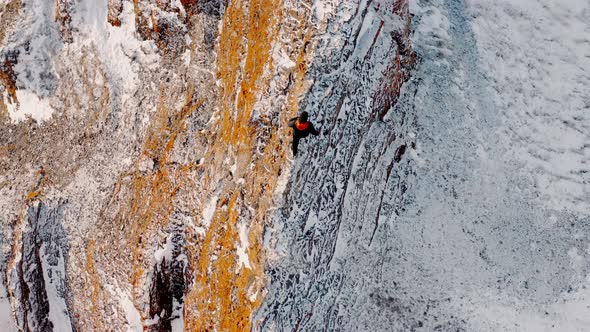 The Red Ridge rock Eastern slope of the Torgash ridge Walking man on the peak of a hill alt