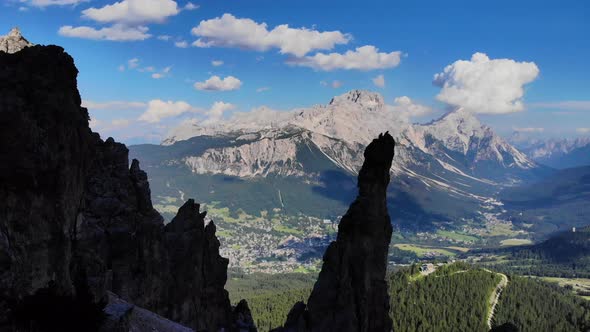 Dolomites Mountains Italy. Aerial view of Cortina d' Ampezzo surrounded by majestic mountains. alt
