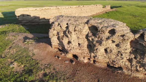 Ruins of Ancient City, Building and Wall From Ancient Times in Treeless Vast Plain of Mongolia alt