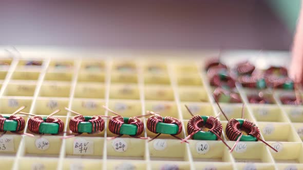 Slider Shot of a Many Twisted Copper Coils Lie alt