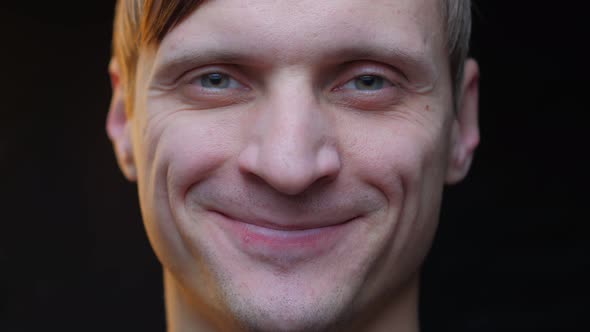 Smiling Man Looks Up alt