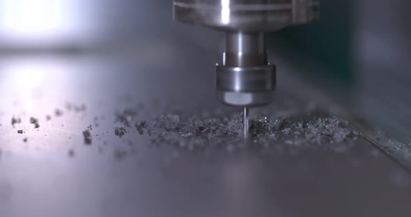 Closeup Drill Cuts Out the Details of the Program Cnc alt