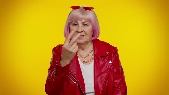 Elderly Woman Pointing at Her Eyes and Camera Show I Am Watching you Gesture Spying on Someone alt