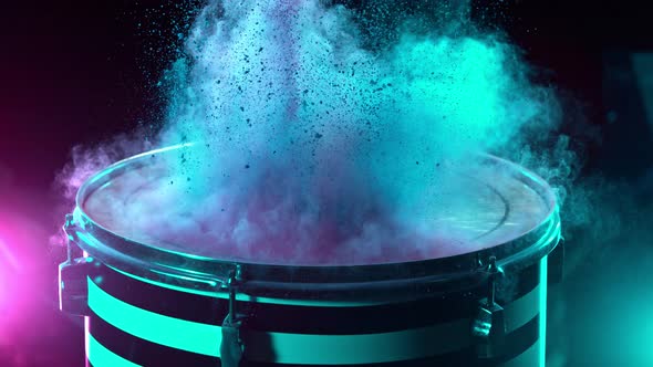 Super Slow Motion Shot of Drum Hit with Color Powder Explosion at 1000 Fps. alt