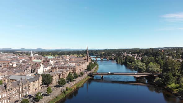 Beautiful calm summer day in Perth above the River Tay. Aerial shot drone descending alt