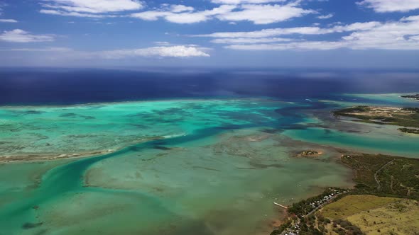The View From the Bird's Eye View of the Fishing Village and the Mountains alt