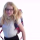 Beautiful Schoolgirl with a School Backpack and Wearing Glasses Dancing in the Studio on a White - VideoHive Item for Sale