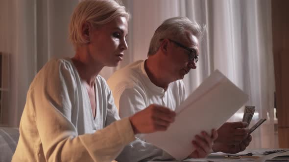 Financial Spending Middleaged Couple Bills Payments alt