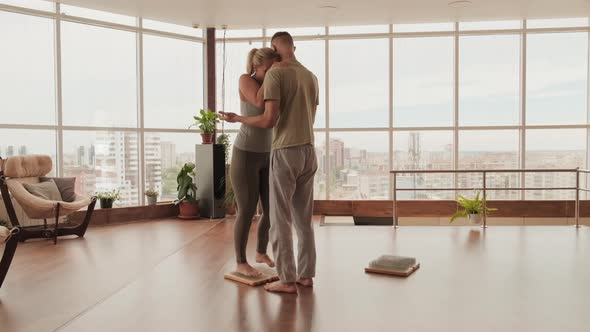 Woman Standing On Nails At Yoga Class alt