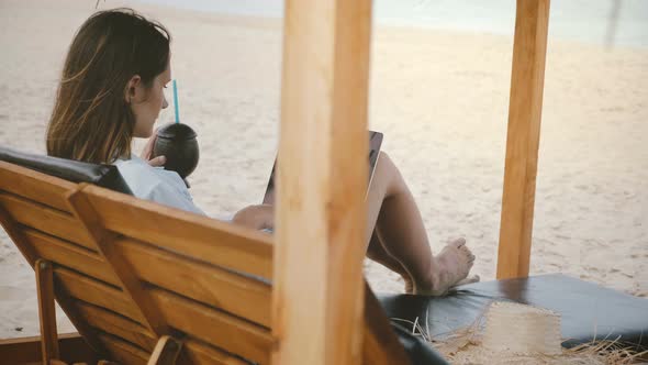 Amazing Background Shot of Focused Successful Workaholic Businesswoman with Drink Using Laptop in alt