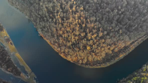 A Bird's-eye View of a Picturesque Landscape with a Winding River and Fabulous Autumn Trees, a High alt