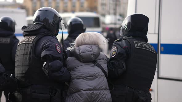 Riot Police Arrest Girl on Protest Russia alt