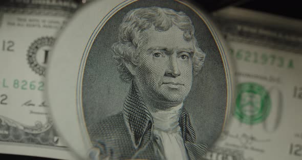 Two Us Dollars Cash Macro View. $ 2 Cash. Under A Magnifying Glass. One Hundred Dollars Close Up. alt