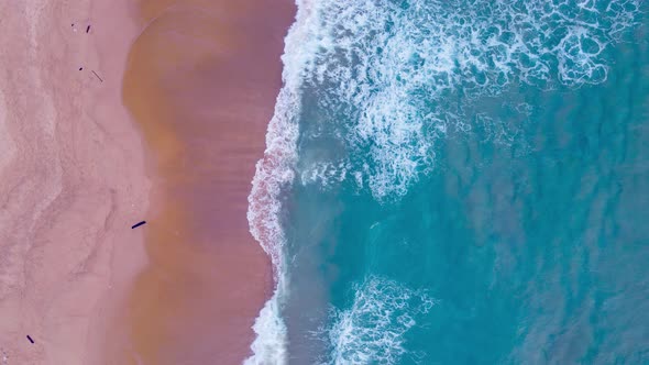 Aerial view of drone. Scene of top view beach and crystal seawater on sandy beach in summer alt