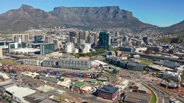 Aerial shot moving toward the city of Cape Town and majestic Table Mountain