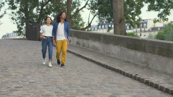Couple in love walking in Paris, France