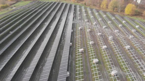Solar Panel Construction on Rural Field Pull Back Aerial