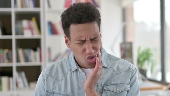Young African American Man with Toothache Tooth Infection alt