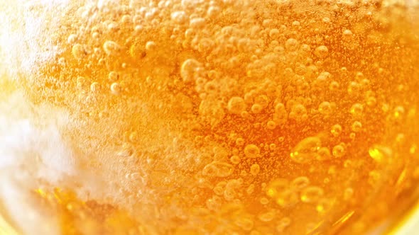 Super Slow Motion Detail Shot of Pouring Beer Into Glass at 1000Fps alt