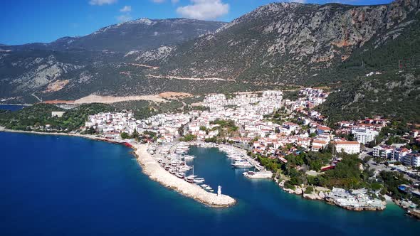 The top view from the drone of Kas resorts, bay, yahts, city in Mugla in Turkey alt