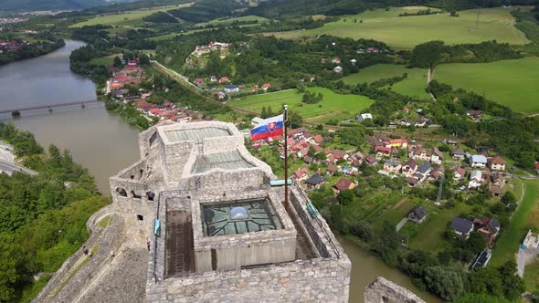 A view of the Slovak flag at the castle in the village of Strecno in Slovakia alt