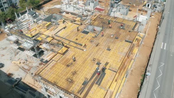 Dron View of Builders Working on a Construction Site