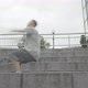 Back Flipping of Young Confident Caucasian Man on Urban Stairs, Wide Shot Portrait of Handsome - VideoHive Item for Sale